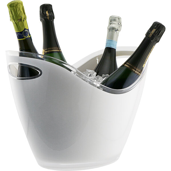 A Franmara white oval wine bucket holding four bottles of wine.