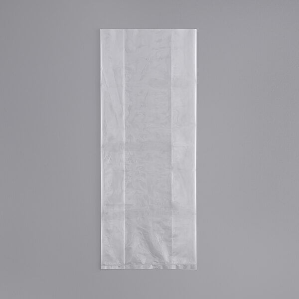 A white plastic LK Packaging food bag on a gray background.