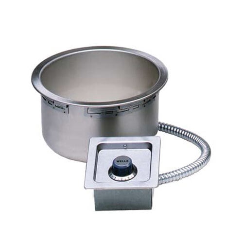 A stainless steel Wells drop-in soup well with a drain and hose.