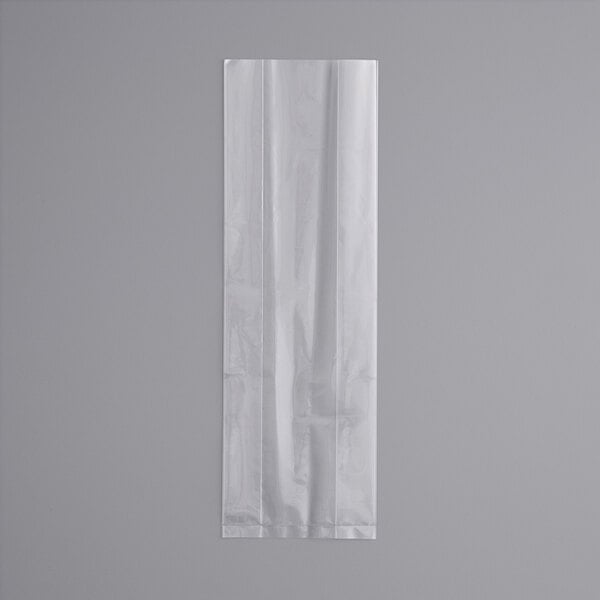 A white plastic bag of LK Packaging food bags on a gray background.