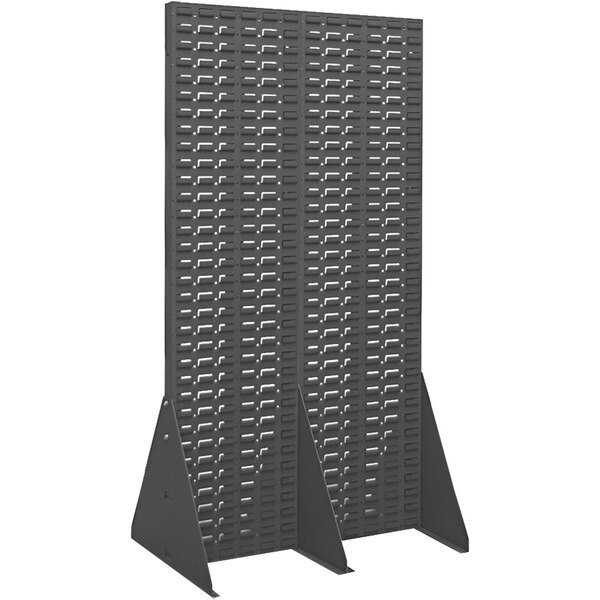 A gray steel double-sided louvered rack with metal shelves.