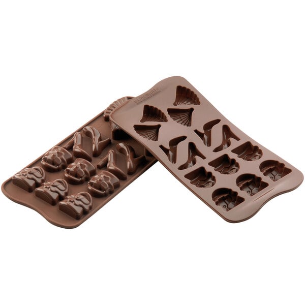 A Silikomart brown silicone chocolate mold with 14 compartments in different shapes.