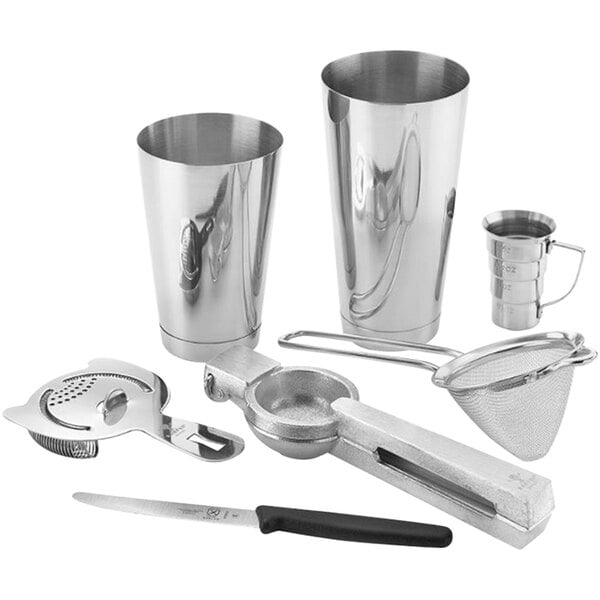 A group of silver Barfly stainless steel cocktail tools on a counter.