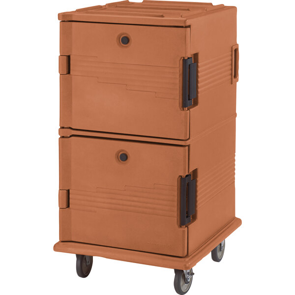 A brown Cambro insulated food pan carrier on wheels with black handles.