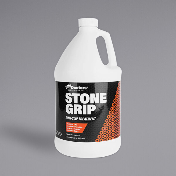 A white bottle of SlipDoctors Stone Grip with a black label and orange accents.