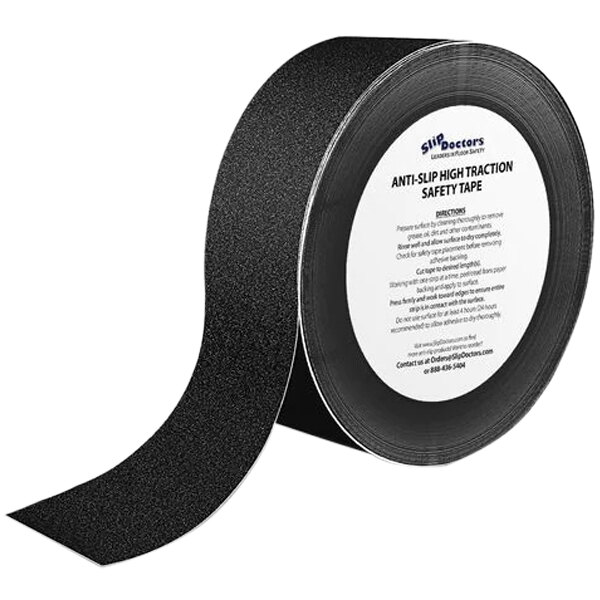 A roll of black SlipDoctors safety tape with white text.