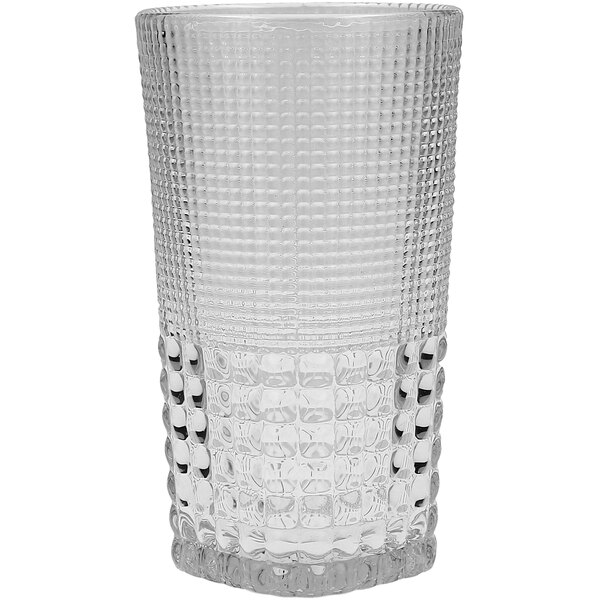 A close-up of a Fortessa clear beverage glass with a textured pattern.