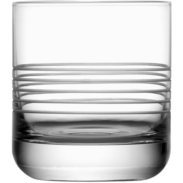 A clear Fortessa Crafthouse double old fashioned glass with a white line.