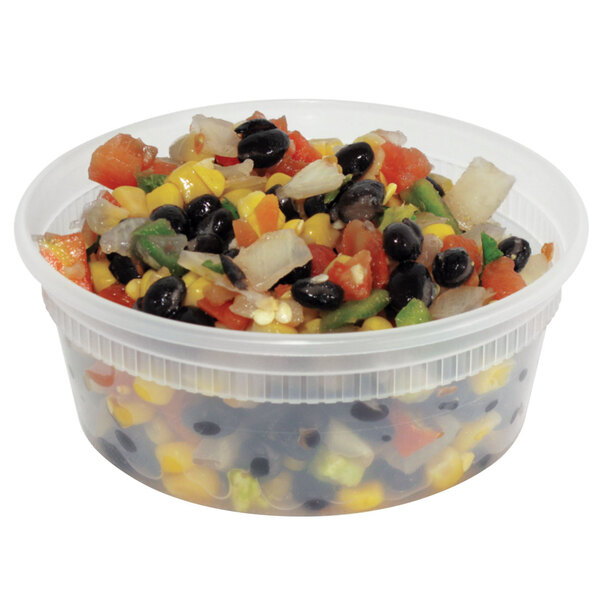 A Pactiv translucent round deli container filled with mixed vegetables.