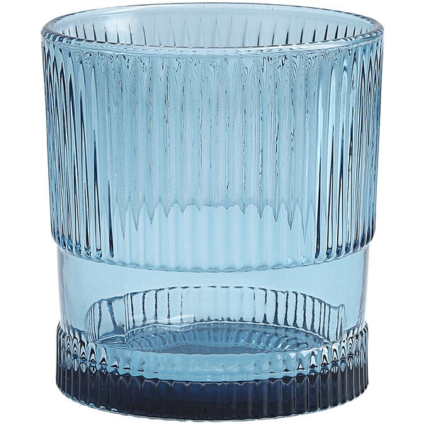 A clear blue glass with a rippled design.