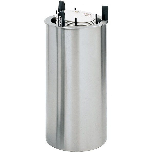 A metal container with a stack of plates inside a silver cylinder.