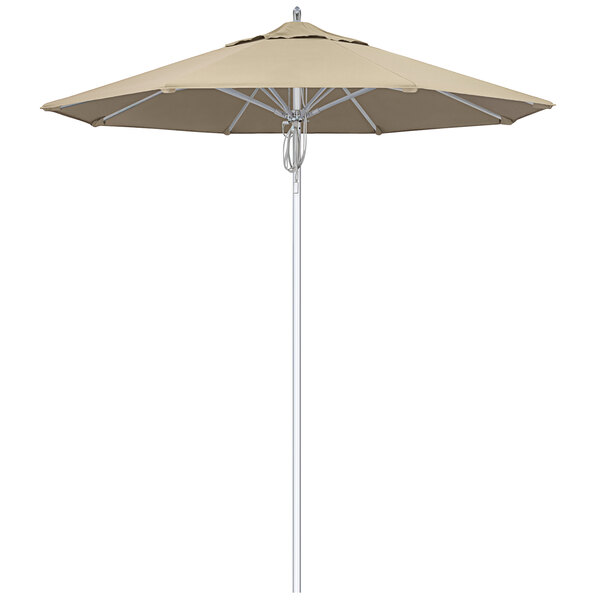 A close-up of a California Umbrella Newport Series outdoor umbrella with an Antique Beige Sunbrella canopy.