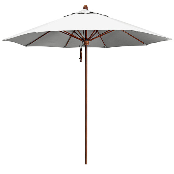 A white California Umbrella with a simulation wood pole.