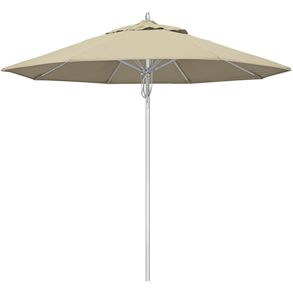 A close-up of a California Umbrella Newport 9' outdoor umbrella with an Antique Beige Sunbrella canopy.