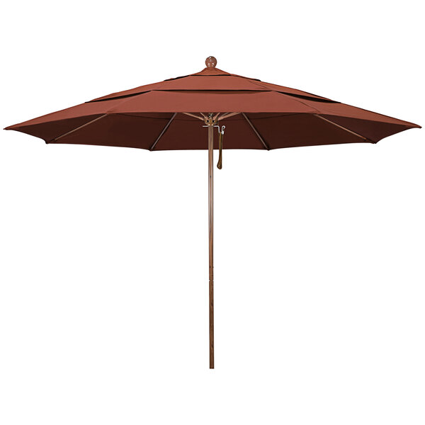 A close-up of a California Umbrella with a brown Sunbrella canopy and American Oak pole.