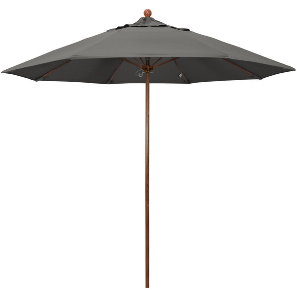 A black California Umbrella with a wooden pole and Sunbrella Charcoal fabric.