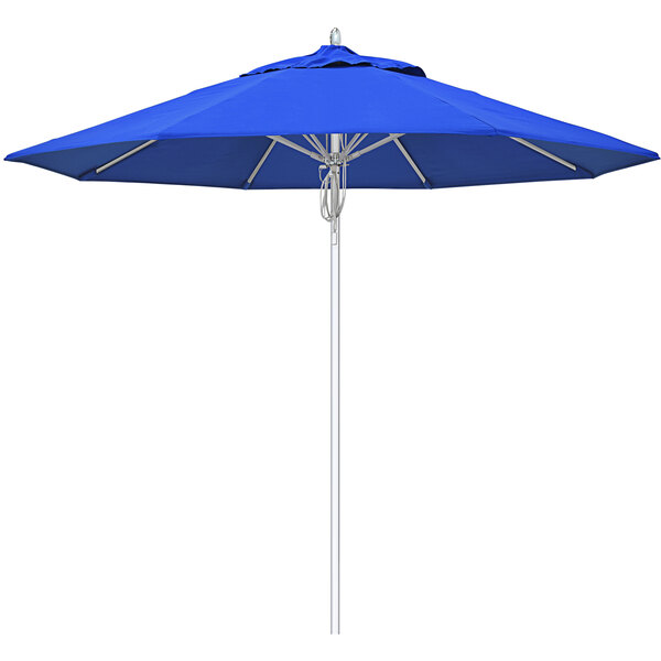 A California Umbrella Newport series outdoor table umbrella with Pacific Blue Sunbrella fabric.