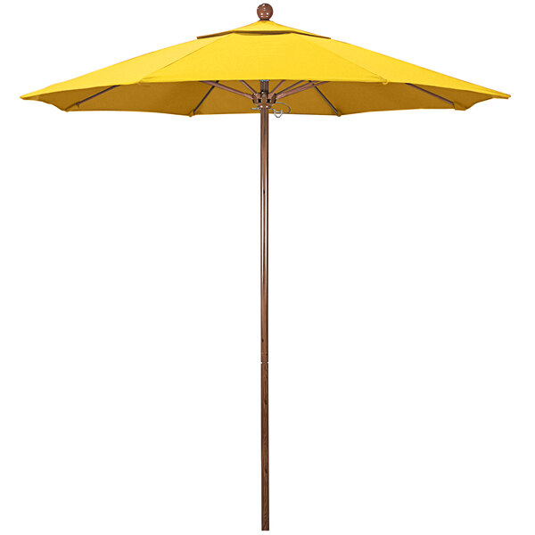A close-up of a California Umbrella with Sunflower Yellow Sunbrella fabric.