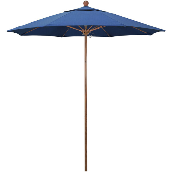 A blue umbrella with a brown American oak pole.