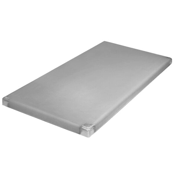 A rectangular silver Champion Tuff Grills plancha plate.