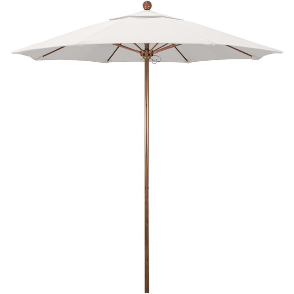 A white California Umbrella with a natural wood pole.
