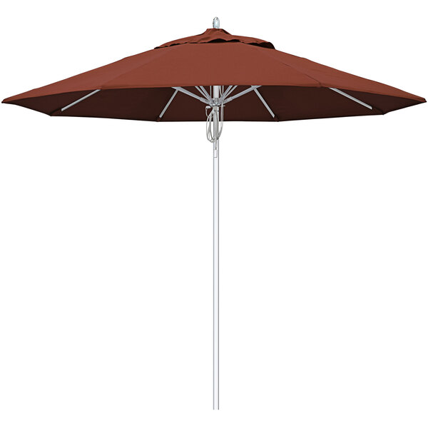 A brown California Umbrella with a silver pole and terracotta fabric.