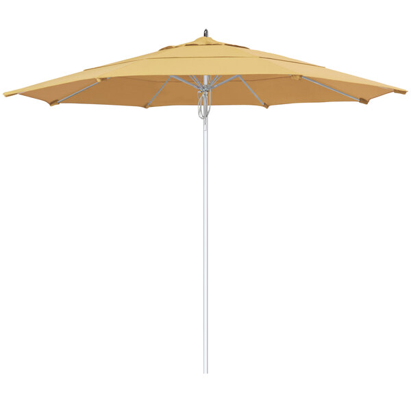 A close-up of a yellow California Umbrella with a wheat Sunbrella canopy.