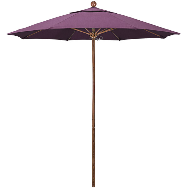 A purple umbrella with a wooden pole.