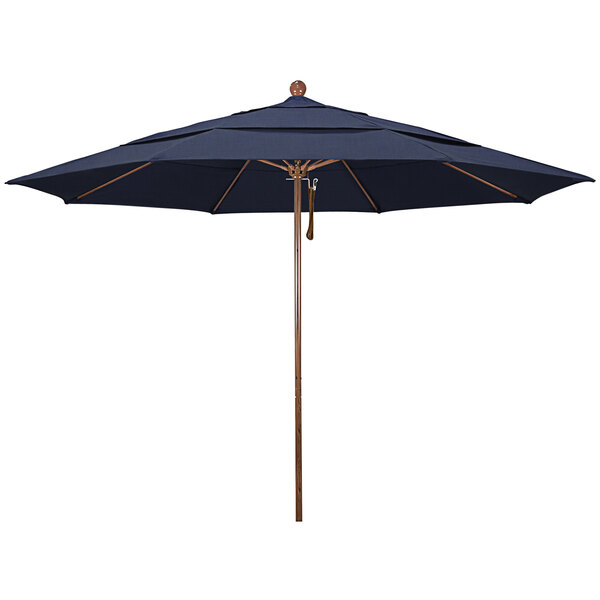 A blue umbrella with a wooden pole and a black shade.