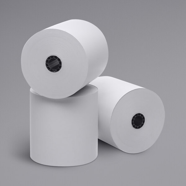 A group of white Point Plus thermal paper rolls.