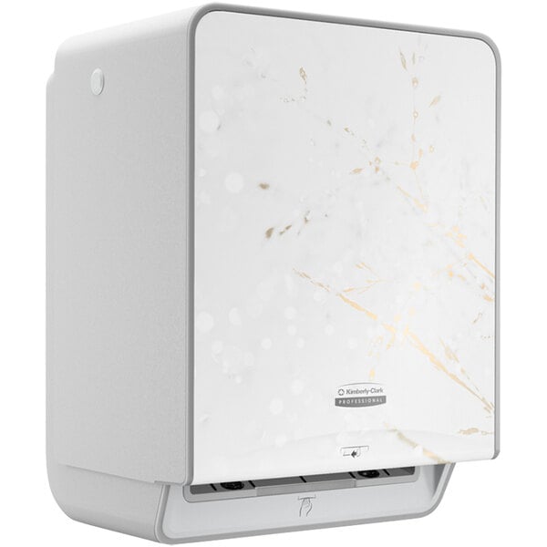 A white rectangular Kimberly-Clark Professional paper towel dispenser with gold and silver designs.