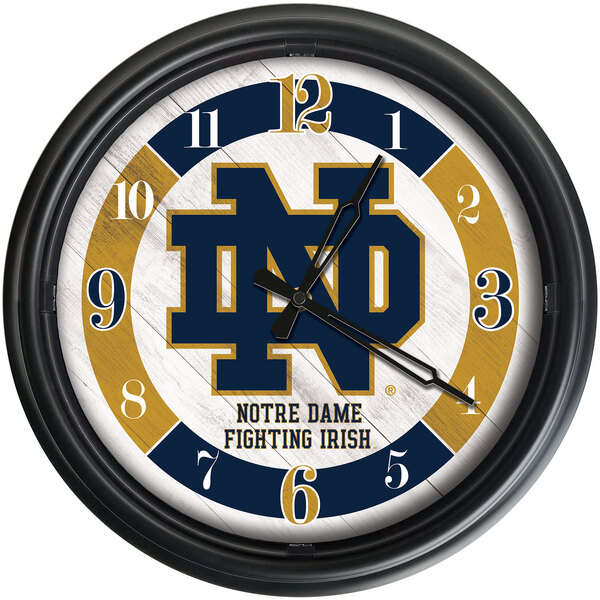 A Holland Bar Stool Notre Dame Fighting Irish wall clock with LED lights.