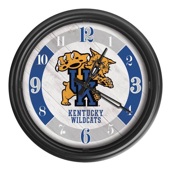 A blue and white Holland Bar Stool University of Kentucky wall clock with a wildcat logo.