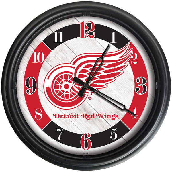 A Holland Bar Stool Detroit Red Wings wall clock with LED lights.