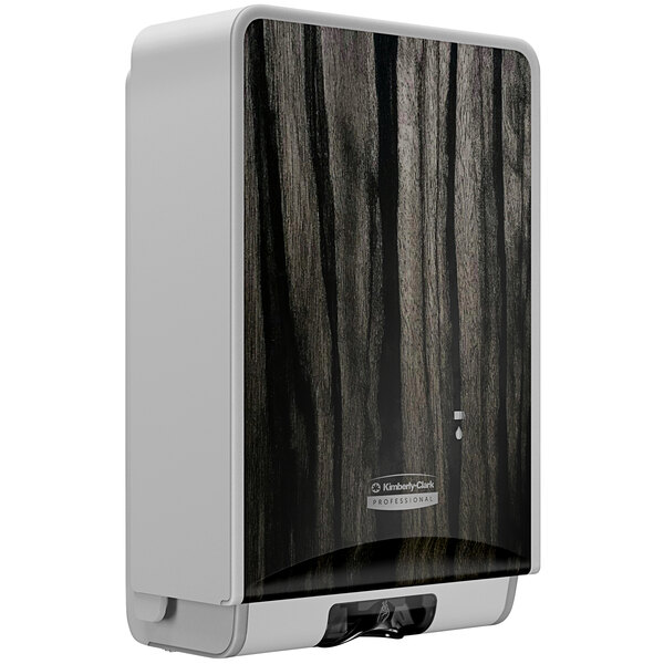 A white rectangular Kimberly-Clark Professional ICON soap and sanitizer dispenser with a black and white image on the front.