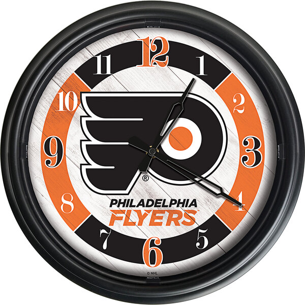 A Holland Bar Stool Philadelphia Flyers wall clock with LED lights.