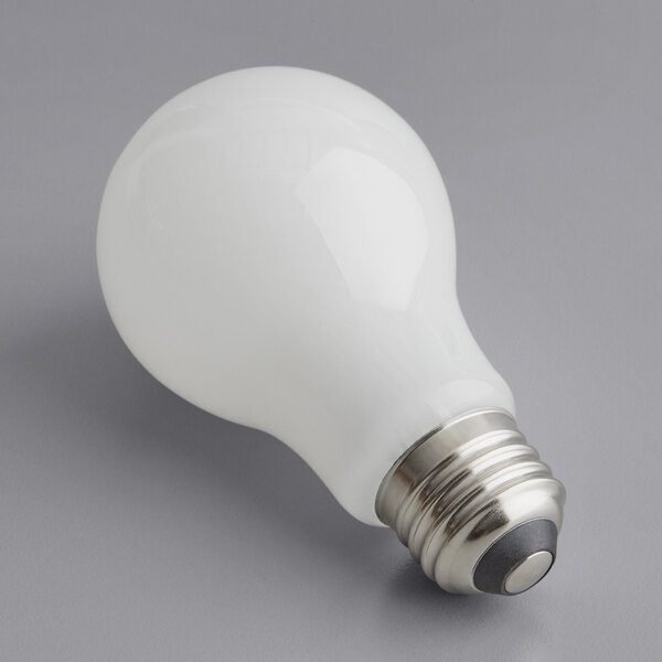 A TCP Pro Line dimmable frosted LED light bulb.