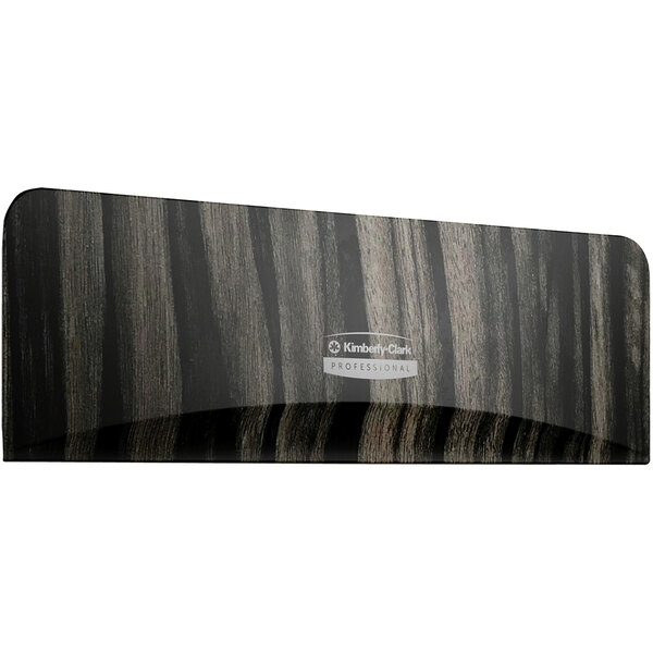 A black and grey rectangular woodgrain faceplate with a black and white ICON logo.