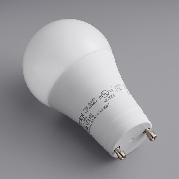A TCP dimmable LED light bulb with GU24 base in white on a gray surface.