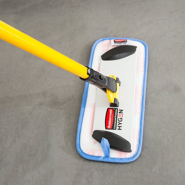 A Rubbermaid blue microfiber wet mop pad with a black hook and loop attachment.