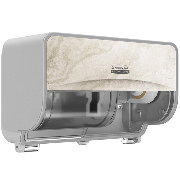A white and silver Kimberly-Clark Professional toilet paper dispenser with a white and grey design.