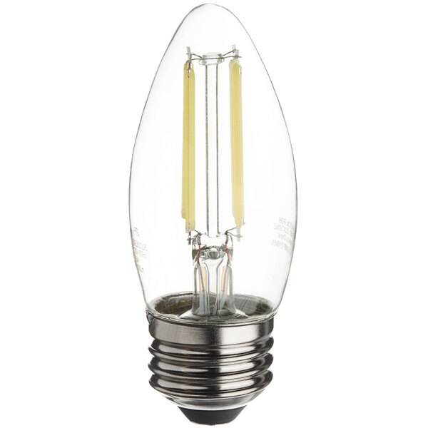 A close-up of a TCP Clear Filament LED light bulb with a clear base.