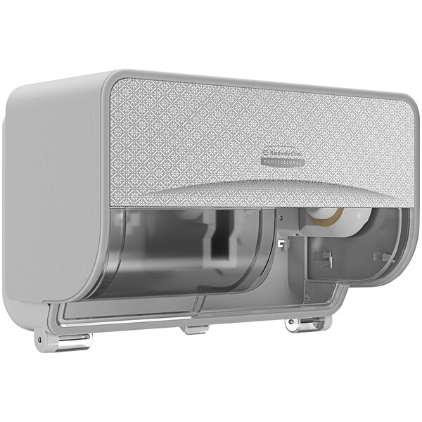 A white Kimberly-Clark Professional ICON Coreless Standard Roll horizontal toilet paper dispenser with a silver mosaic faceplate.