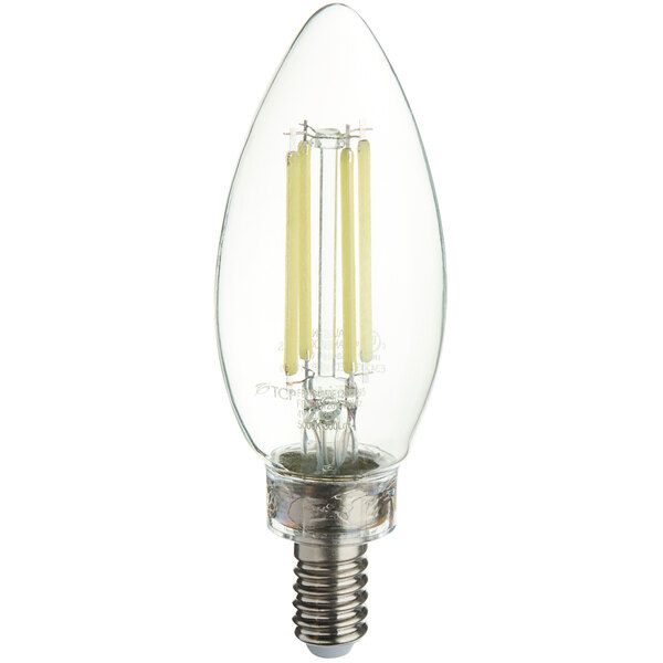 A close-up of a TCP clear LED filament light bulb with a clear E12 base.