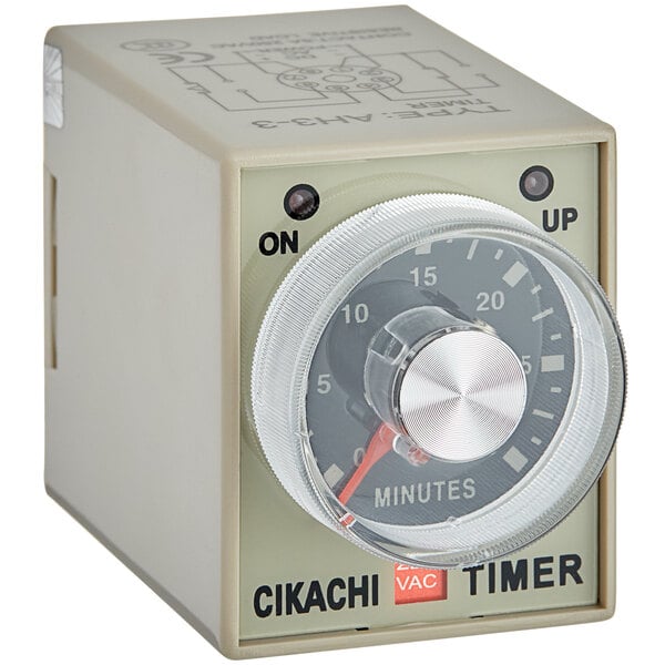 A white Estella timer with a black dial.
