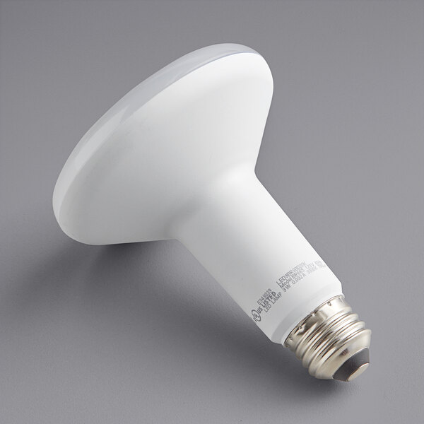 A TCP Elite dimmable LED lamp with a white light bulb.