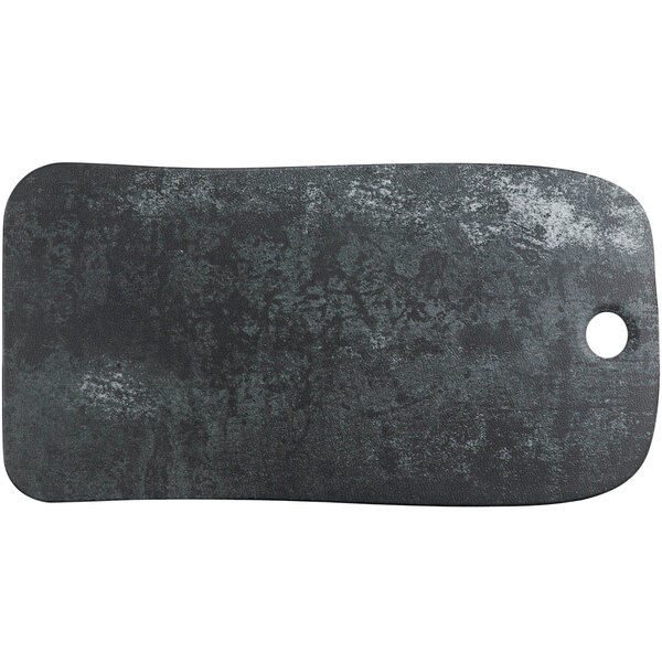 A black rectangular cheforward by GET melamine serving board with a grey granite surface.