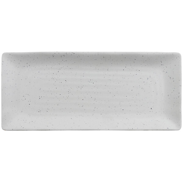 A white rectangular melamine platter with speckled specks.