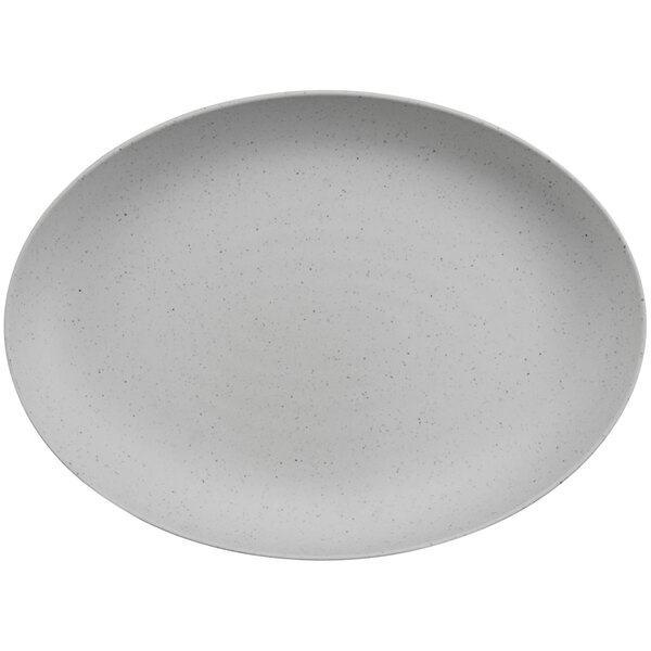 A white oval melamine bowl with speckled stone design.