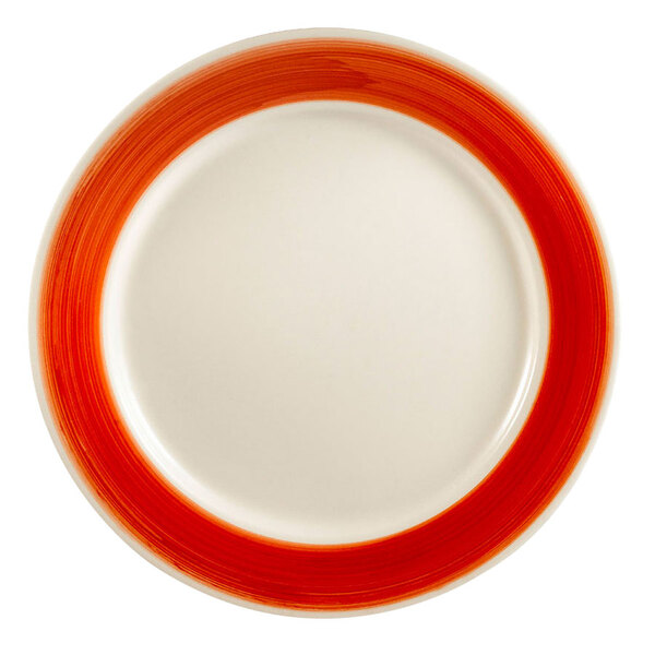 A CAC Rainbow china plate with a red rim.